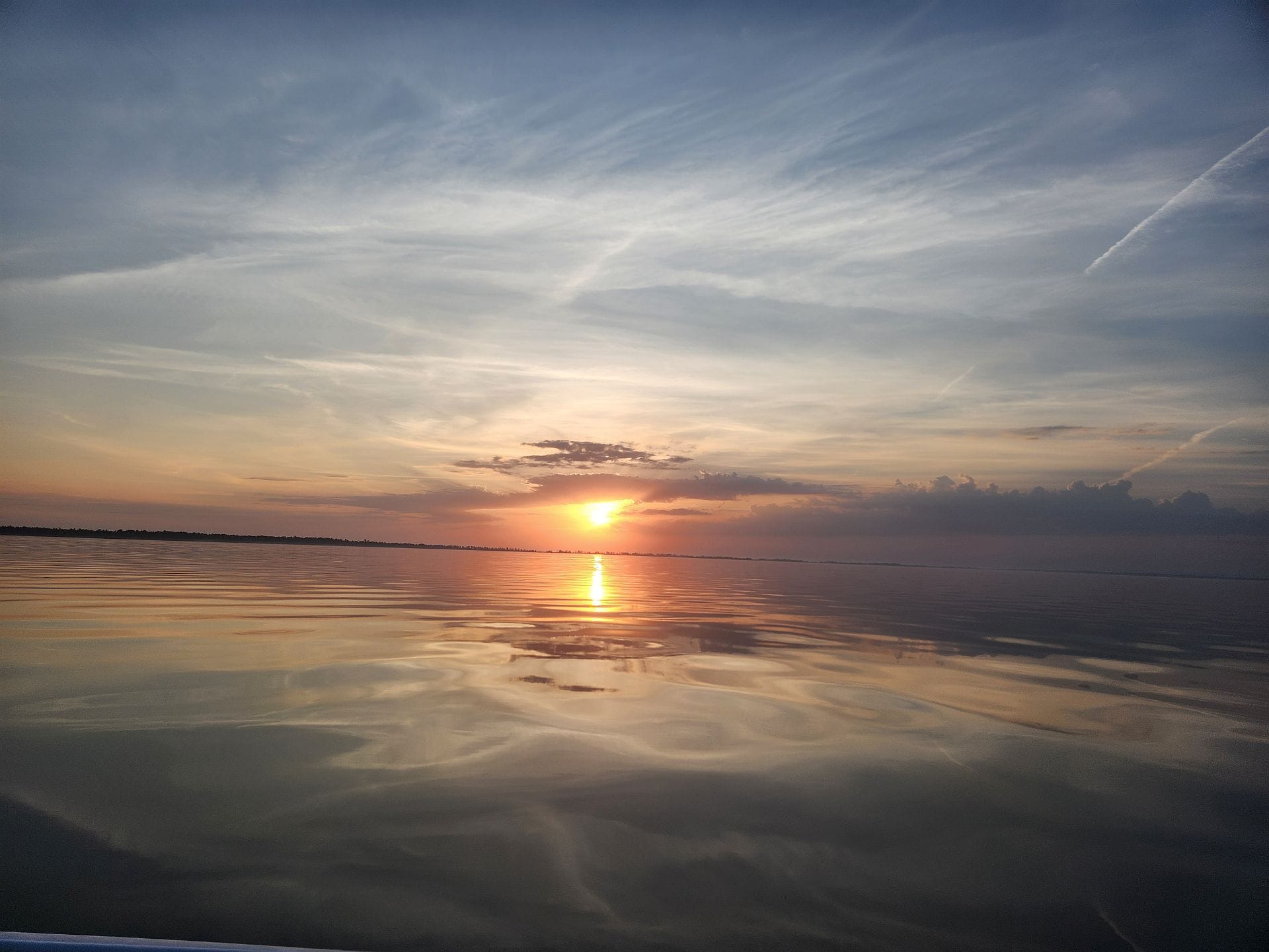 Glass calm Lake Superior sunset — City of Bayfield WI homes for sale