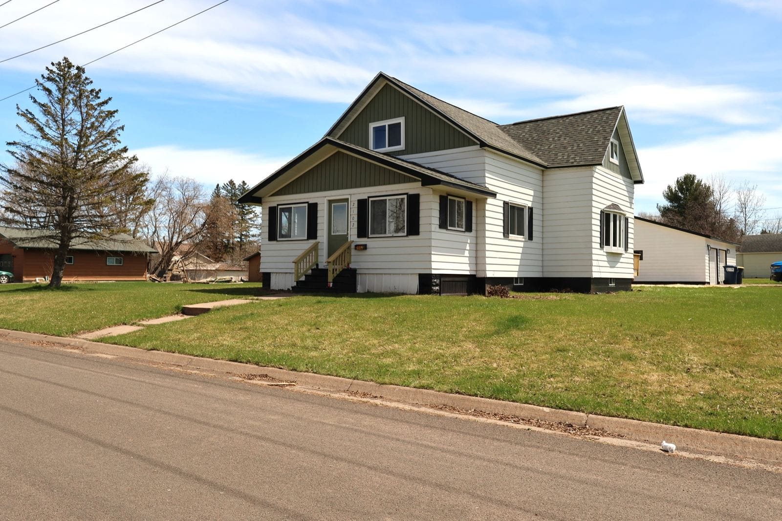 2102 E Main St, Ashland WI - completely remodeled 4-bedroom home for sale with large detached 3-car garage on a .51-acre corner lot