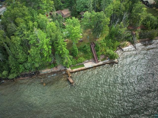 Aerial view of 200 feet of private Lake Superior shoreline at 55161 Corbine Rd in Ashland, WI, showing the grandfathered concrete break wall along the water's edge and the wooded 1.93-acre property above.